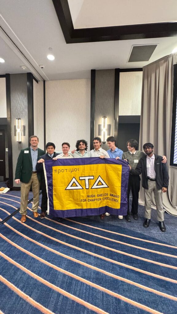 Gamma Beta brothers celebrating the chapter’s recent award